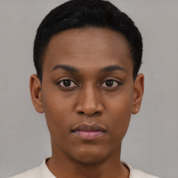 Neutral black young-adult female with short  black hair and brown eyes
