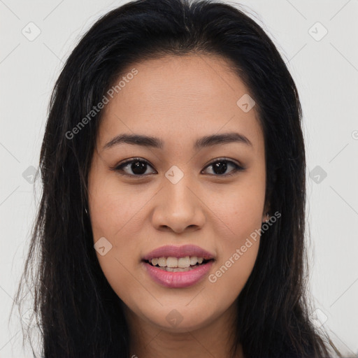 Joyful latino young-adult female with long  brown hair and brown eyes