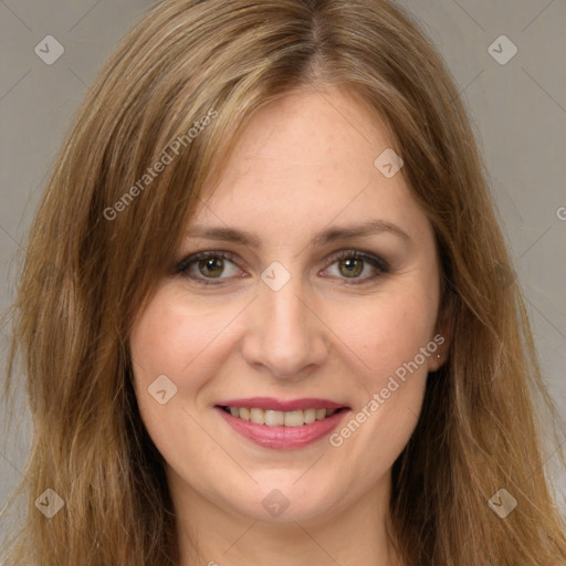 Joyful white young-adult female with long  brown hair and green eyes