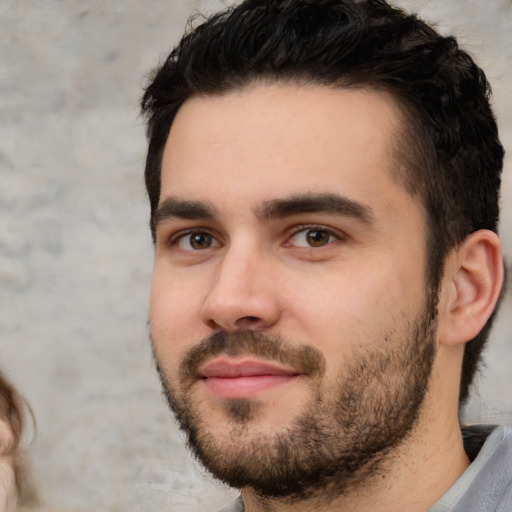 Neutral white young-adult male with short  brown hair and brown eyes