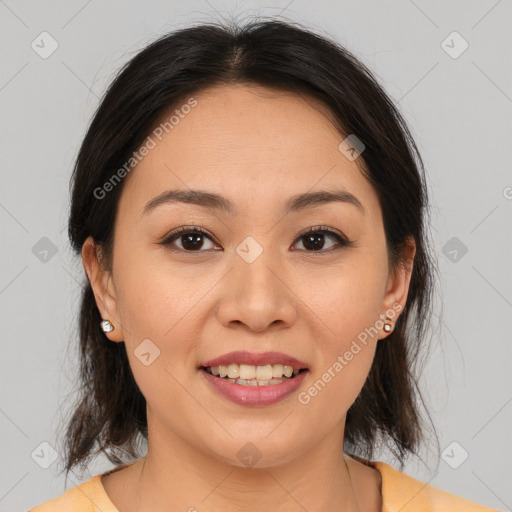 Joyful latino young-adult female with medium  brown hair and brown eyes