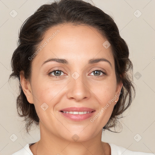 Joyful white young-adult female with medium  brown hair and brown eyes