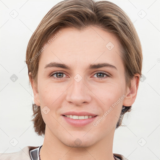 Joyful white young-adult female with short  brown hair and grey eyes