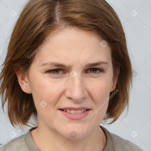 Joyful white adult female with medium  brown hair and grey eyes