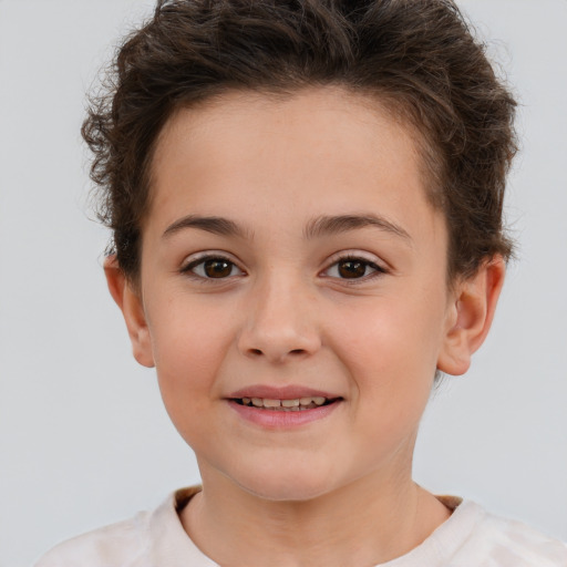 Joyful white child female with short  brown hair and brown eyes