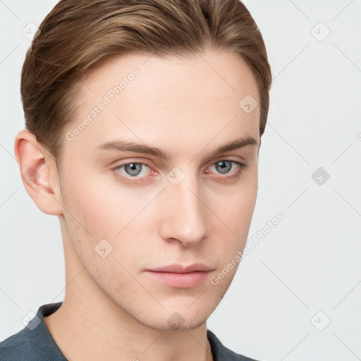 Neutral white young-adult male with short  brown hair and grey eyes