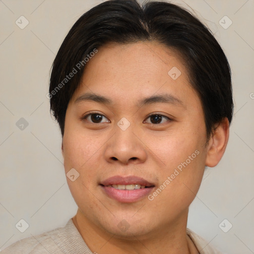 Joyful asian young-adult female with short  brown hair and brown eyes