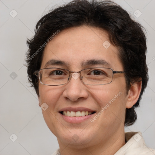 Joyful white adult female with short  brown hair and brown eyes