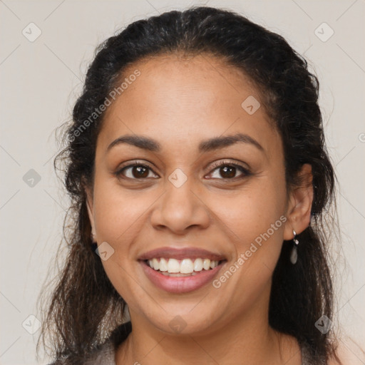 Joyful latino young-adult female with medium  brown hair and brown eyes