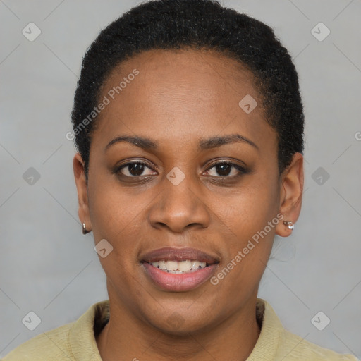 Joyful black young-adult female with short  brown hair and brown eyes