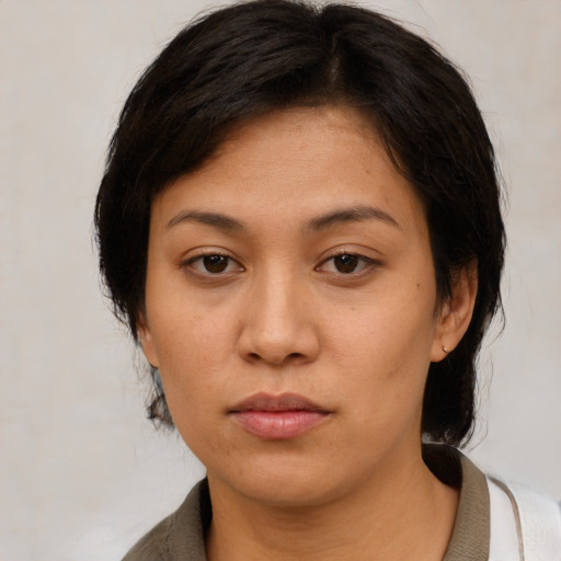 Neutral asian young-adult female with medium  brown hair and brown eyes