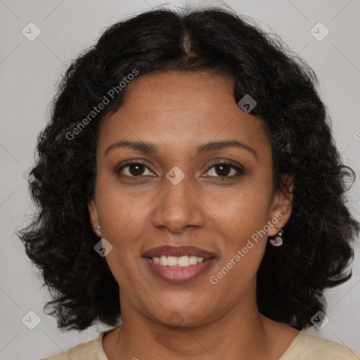 Joyful black adult female with medium  brown hair and brown eyes