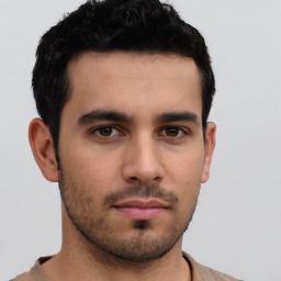 Neutral white young-adult male with short  black hair and brown eyes