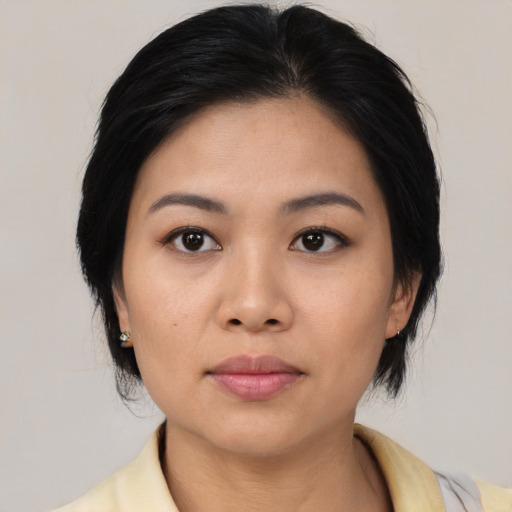 Neutral asian young-adult female with medium  black hair and brown eyes