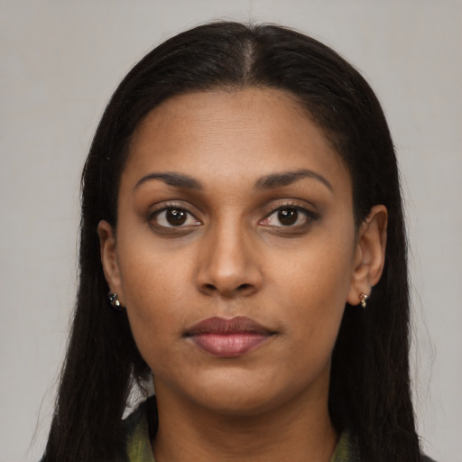 Neutral latino young-adult female with long  black hair and brown eyes
