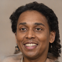 Joyful black adult male with short  brown hair and brown eyes