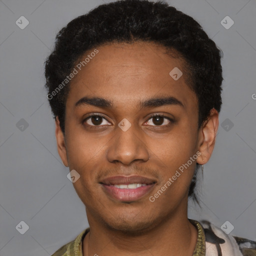 Joyful black young-adult male with short  black hair and brown eyes