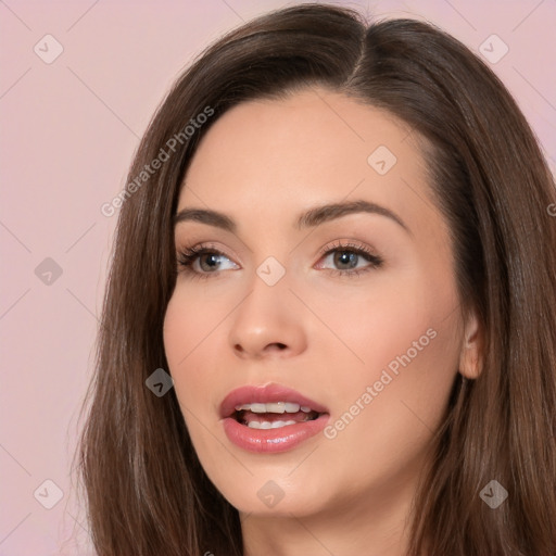 Neutral white young-adult female with long  brown hair and brown eyes