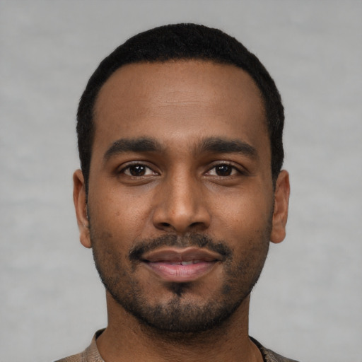 Neutral black young-adult male with short  black hair and brown eyes