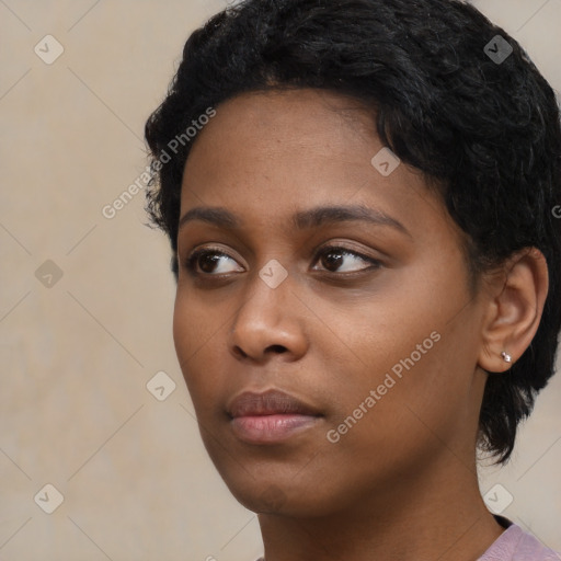 Neutral black young-adult female with short  black hair and brown eyes