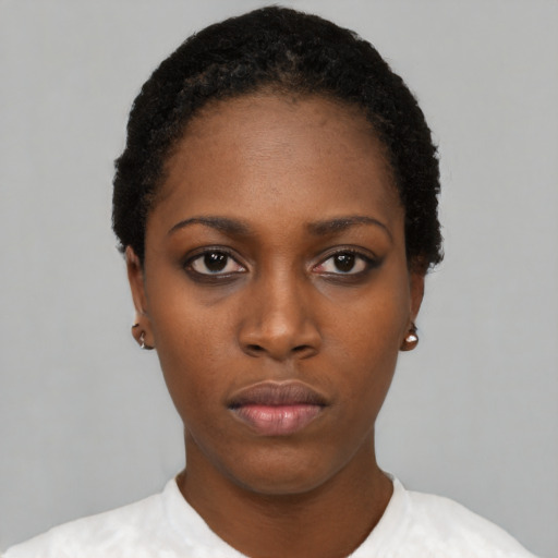 Neutral black young-adult female with short  black hair and brown eyes