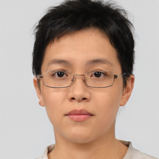 Neutral asian young-adult female with short  brown hair and brown eyes