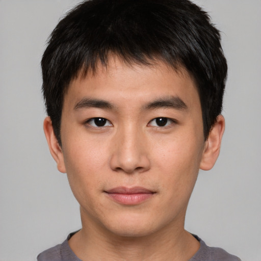 Neutral asian young-adult male with short  brown hair and brown eyes