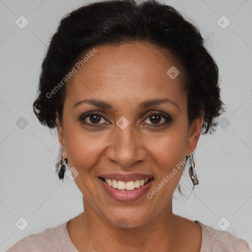 Joyful latino adult female with short  brown hair and brown eyes