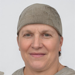 Joyful white adult female with short  brown hair and grey eyes