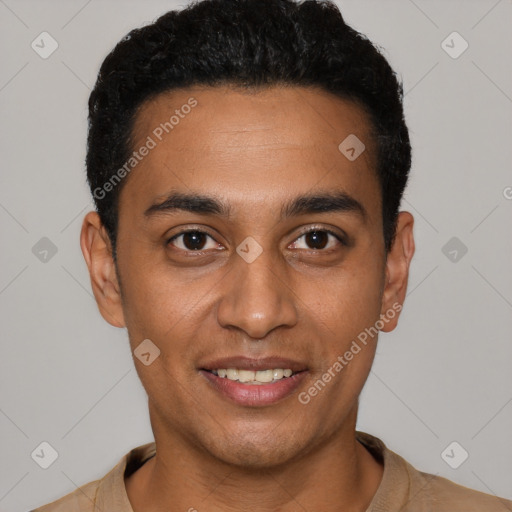 Joyful latino young-adult male with short  black hair and brown eyes