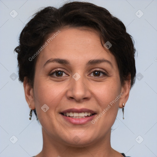 Joyful white adult female with short  brown hair and brown eyes