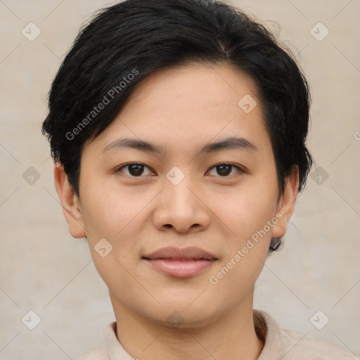 Joyful asian young-adult female with short  brown hair and brown eyes