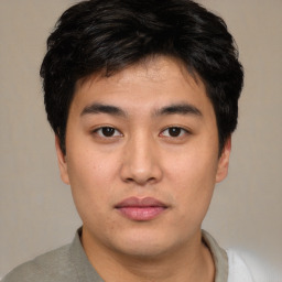 Neutral asian young-adult male with short  brown hair and brown eyes