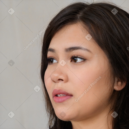 Neutral white young-adult female with long  brown hair and brown eyes