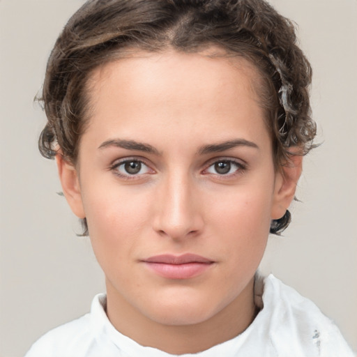 Neutral white young-adult female with short  brown hair and brown eyes