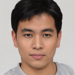 Neutral asian young-adult male with short  black hair and brown eyes