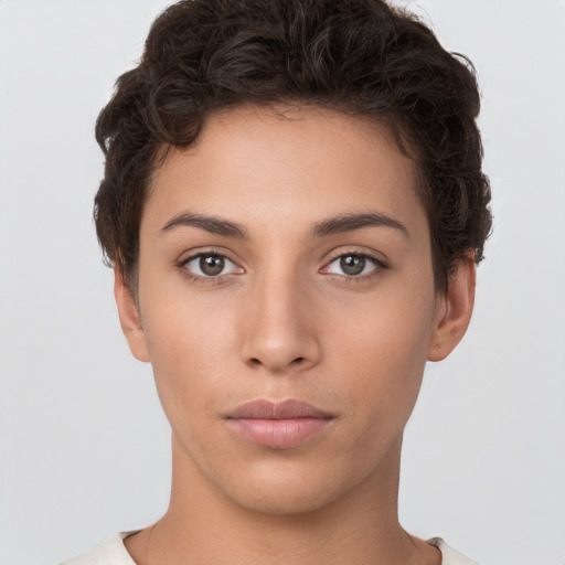 Neutral white young-adult female with short  brown hair and brown eyes