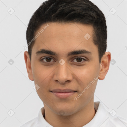 Joyful latino young-adult male with short  brown hair and brown eyes