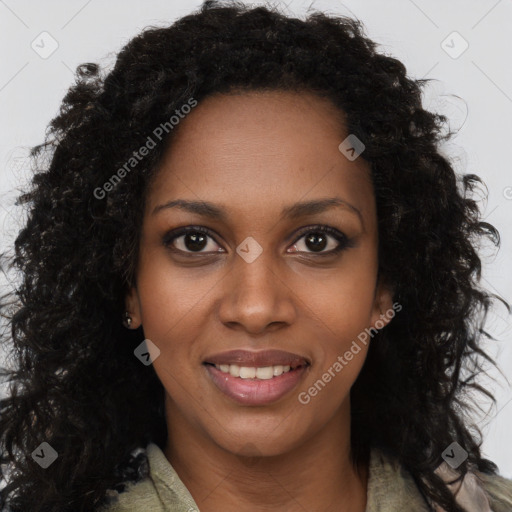 Joyful black young-adult female with long  brown hair and brown eyes