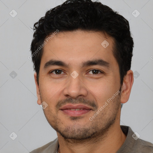 Joyful white young-adult male with short  black hair and brown eyes