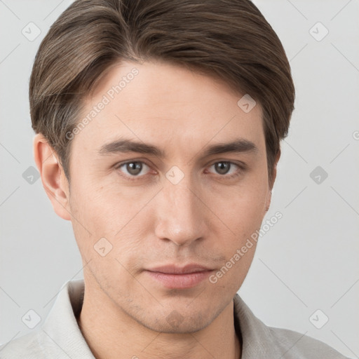 Neutral white young-adult male with short  brown hair and grey eyes