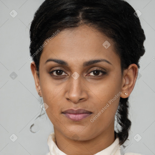 Joyful latino young-adult female with short  brown hair and brown eyes