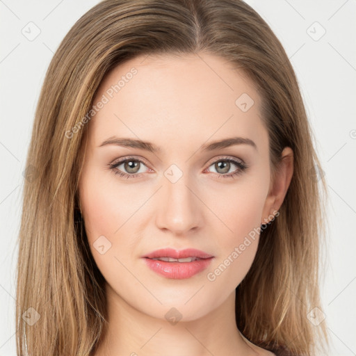 Joyful white young-adult female with long  brown hair and green eyes