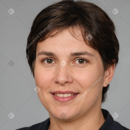 Joyful white adult female with medium  brown hair and brown eyes