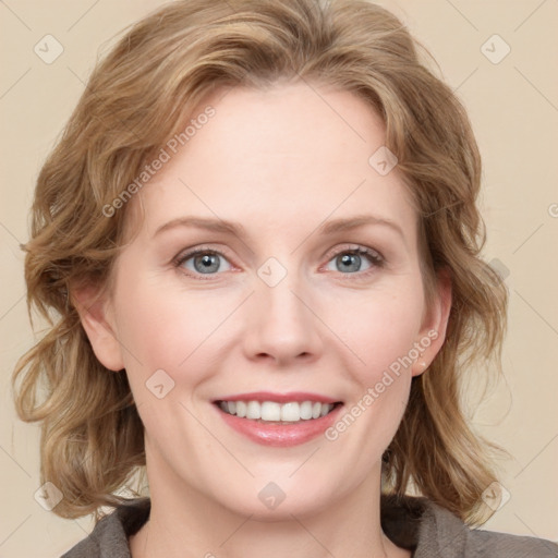 Joyful white young-adult female with medium  brown hair and blue eyes