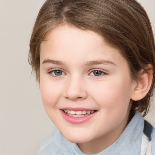 Joyful white child female with medium  brown hair and brown eyes