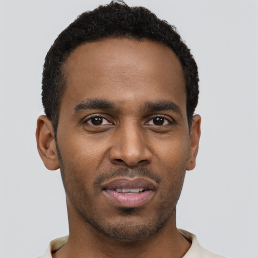 Neutral black young-adult male with short  black hair and brown eyes