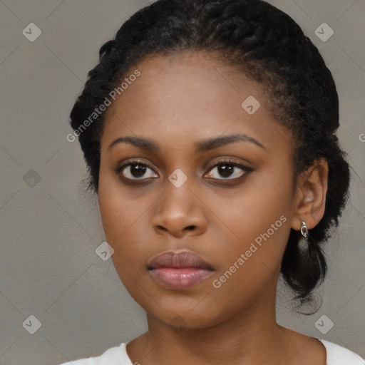 Neutral black young-adult female with medium  black hair and brown eyes