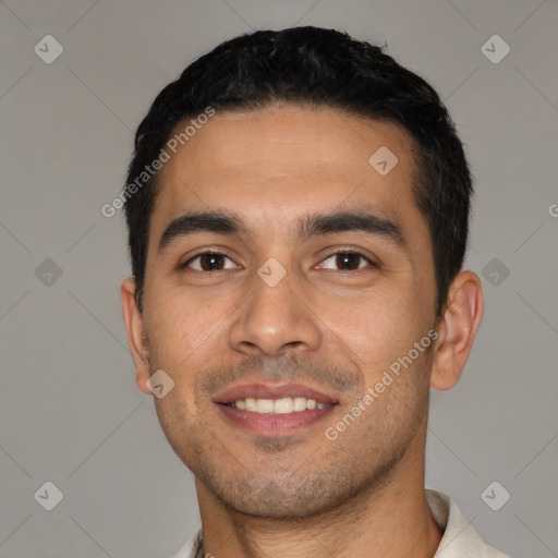 Joyful white young-adult male with short  black hair and brown eyes