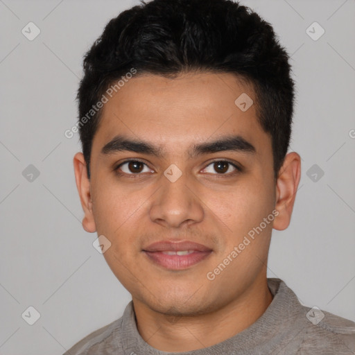 Joyful latino young-adult male with short  black hair and brown eyes